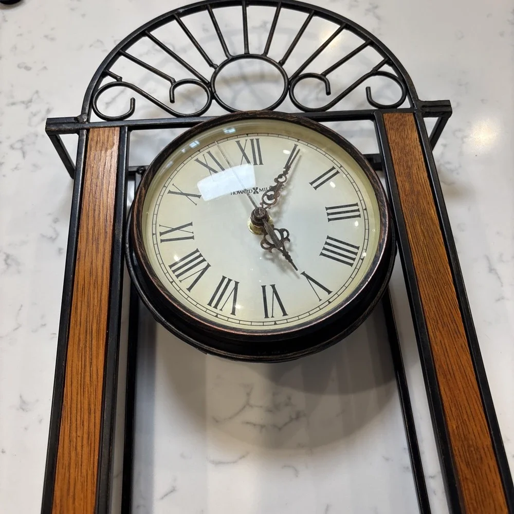 Howard Miller Devahn Wall Clock Antique Bronze Wrought Iron Roman Numeral 625241